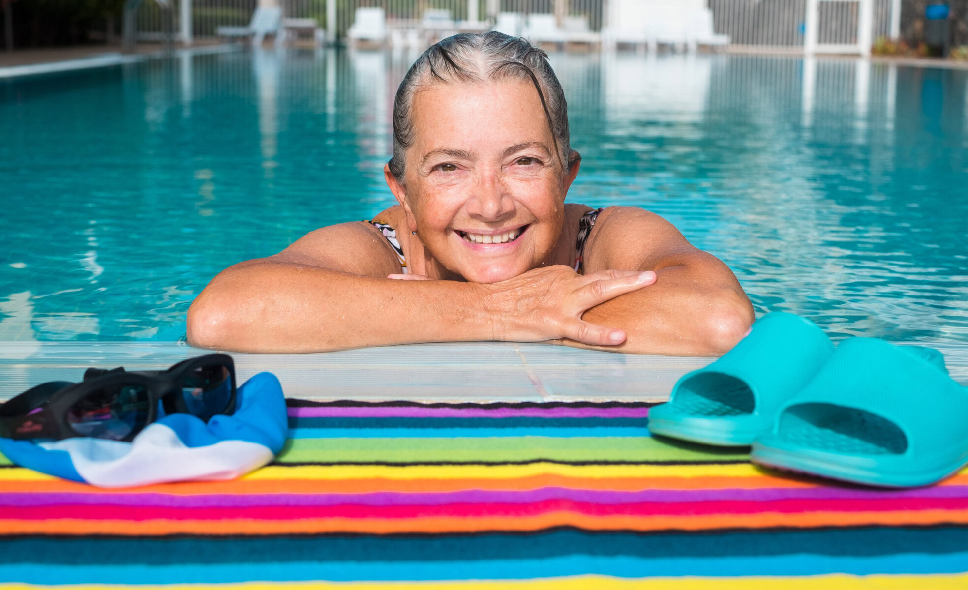An,Old,Lady,,Amused,,Swimming,To,Keep,Fit.,Outdoor,Pool